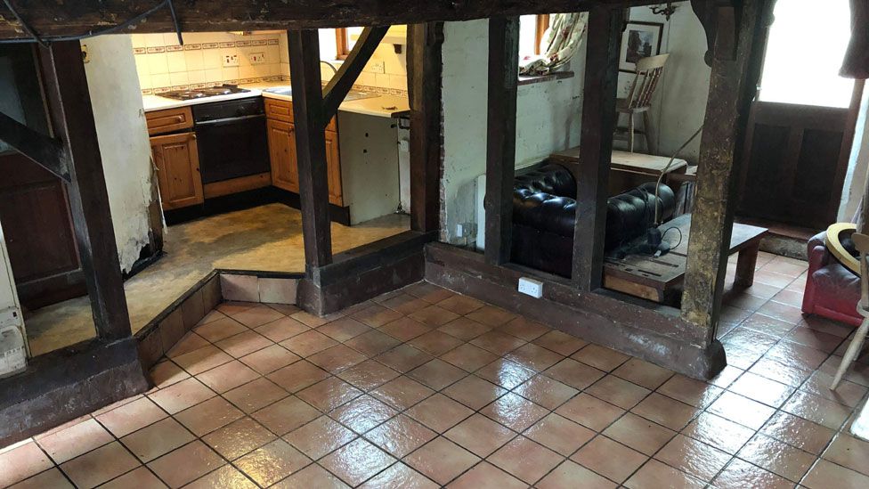 The kitchen and downstairs area after it was cleared and cleaned