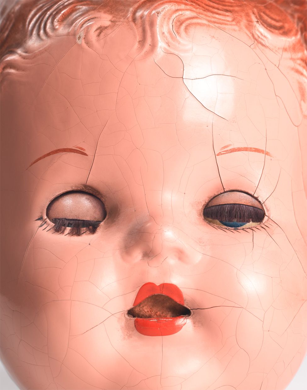 A close-up of a doll's face