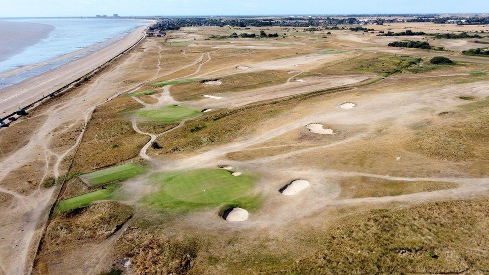 An aerial view of a golf course near New Romney, Kent shows that grass dried out