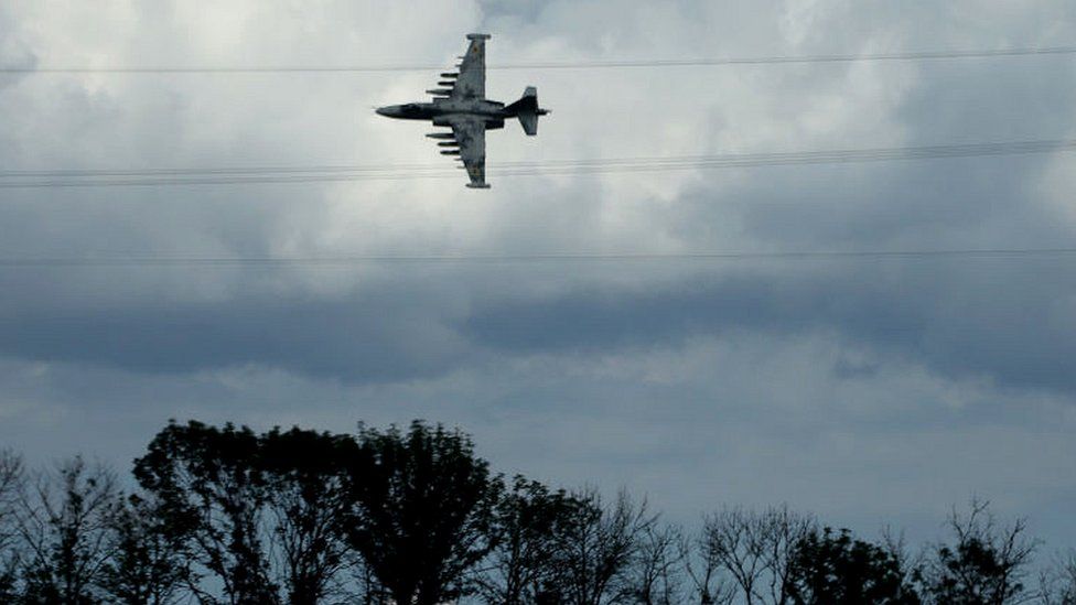 A Ukrainian Air Force Sukhoi Su-25 jet buzzes low in the sky on June 16, 2022 in the Donetsk region, Ukraine