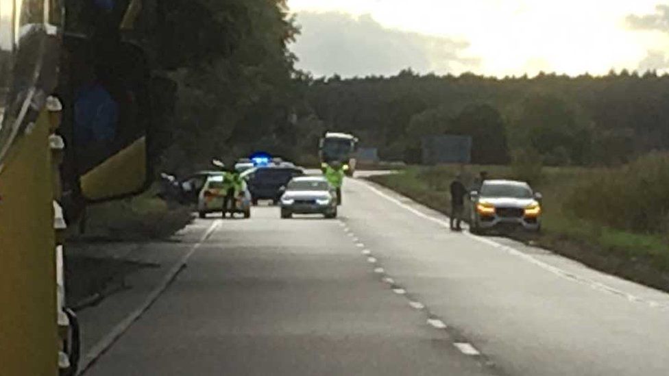 Two car crash closes major road near Forres BBC News