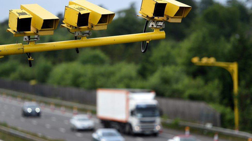 A motorway with ANPR camera