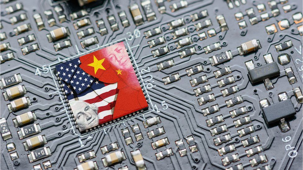 Flag of USA and China on a processor, CPU or GPU microchip on a motherboard.