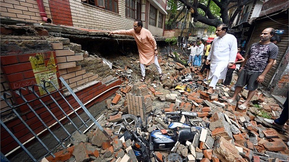 BJP President Virendra Sachdeva visits the site where a wall of a government school in Garhi collapsed following monsoon rains, on July 9, 2023 in New Delhi, India.