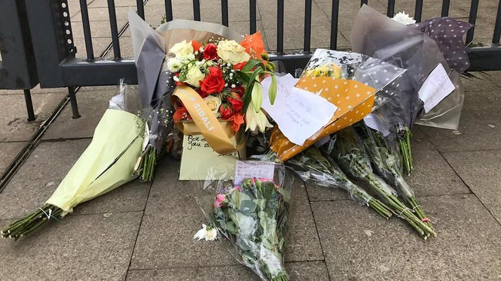 Floral tributes outside Joseph Chamberlain College in Highgate