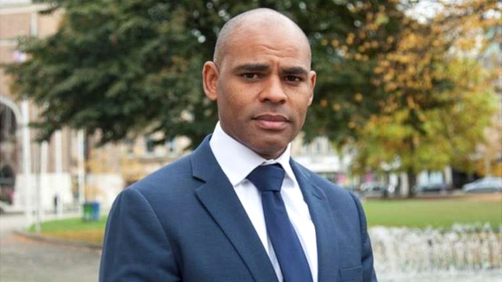 Marvin Rees wearing a blue suit and tie