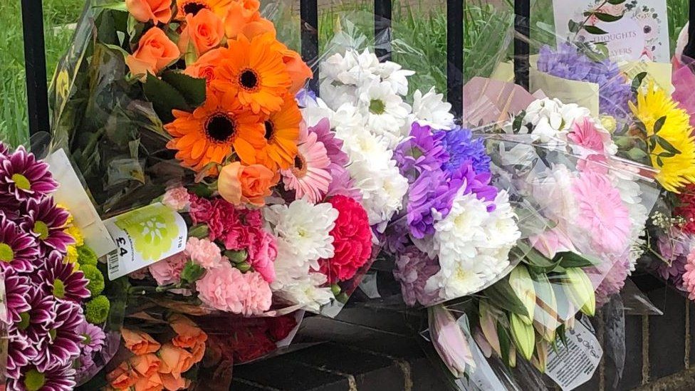 Floral tributes at the scene in Shiregreen, Sheffield