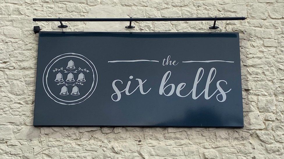 The Six Bells pub sign