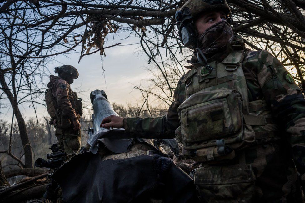 File image of Ukrainian troops preparing artillery cannons
