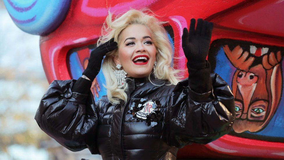 Singer Rita Ora waves to the crowd during the Macy's Thanksgiving Day Parade in Manhattan, New York, 22 November 2018