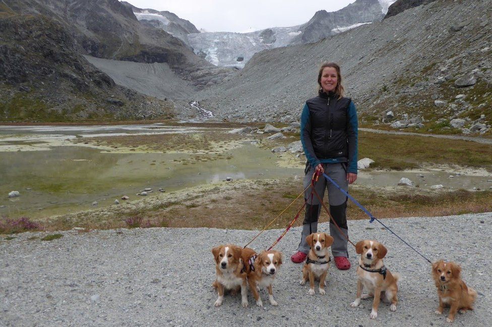 Esther and dogs next to lake