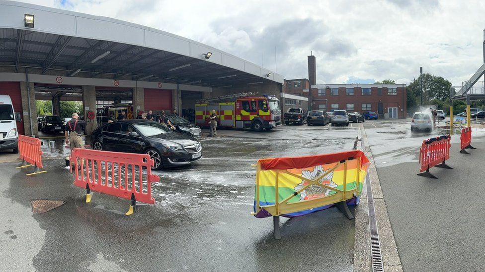 West Midlands firefighter car washes raise £20,000 for swimmer BBC News