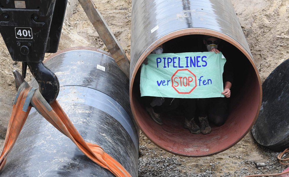 Activists inside the pipeline