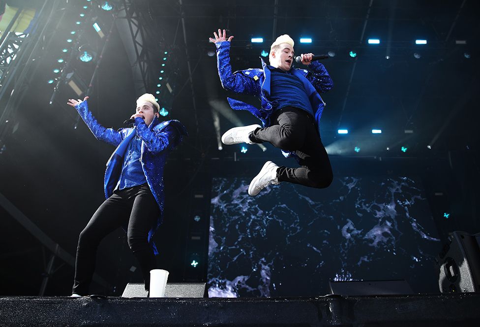 Jedward performs at the Eurovision Village ahead of the Eurovision Song Contest Grand Final