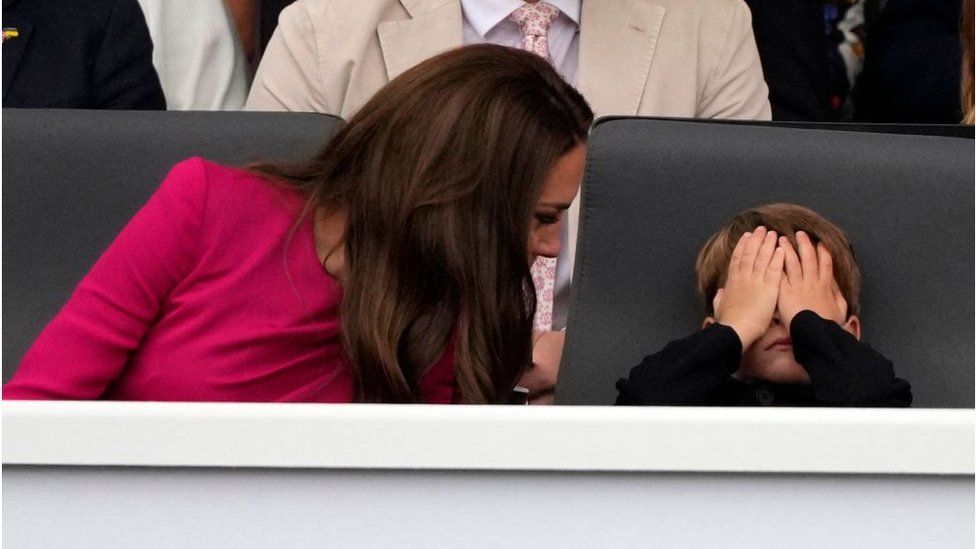 Catherine, Duchess of Cambridge, (L) and Prince Louis of Cambridge (R)