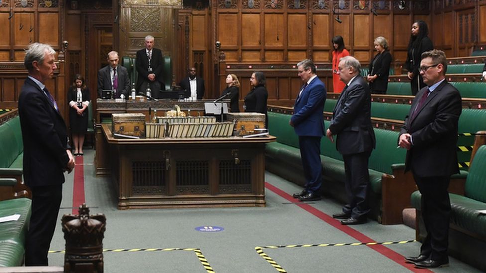 MPs in the Commons stand in silence