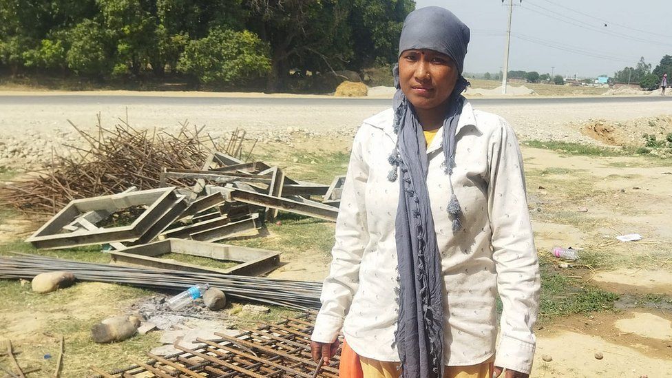 Krishni Tharu works in construction in Nepal to support her family