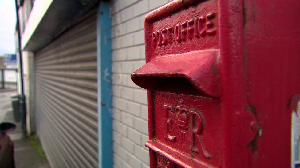 A red Post Office postbox