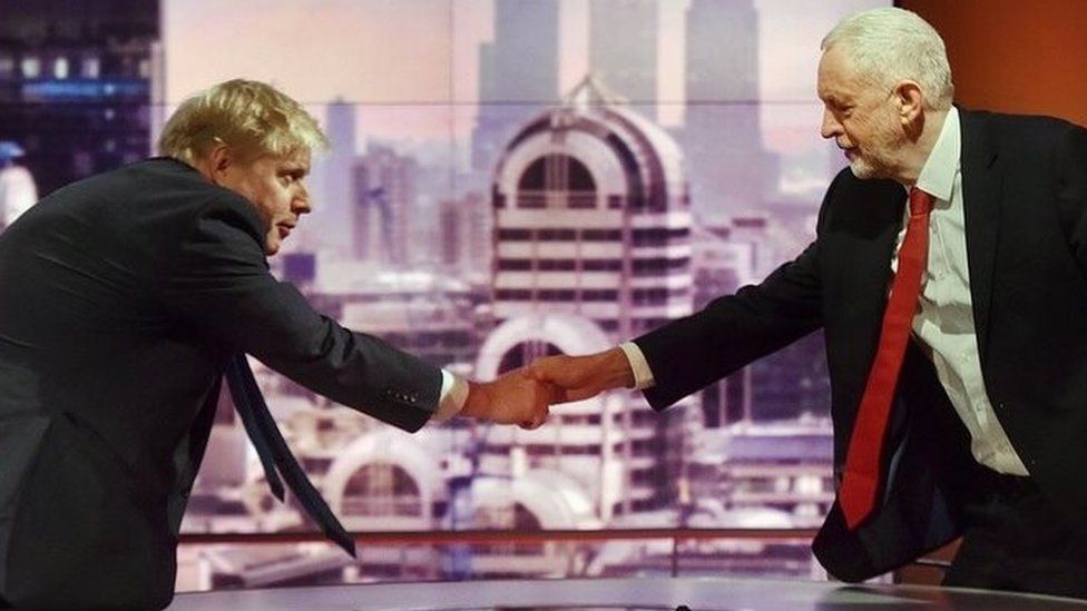 Boris Johnson and Jeremy Corbyn shake hands
