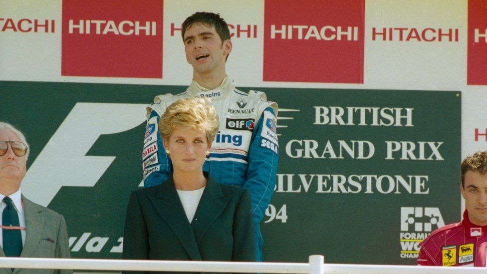 Williams-Renault driver Damon Hill on the podium with Princess Diana after he won the 1994 Grand Prix.