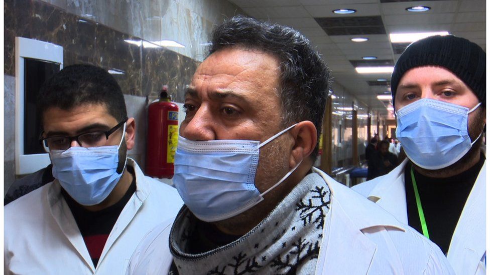 three doctors wearing medical facemasks