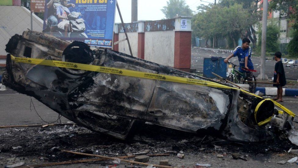 Torched car outside the stadium