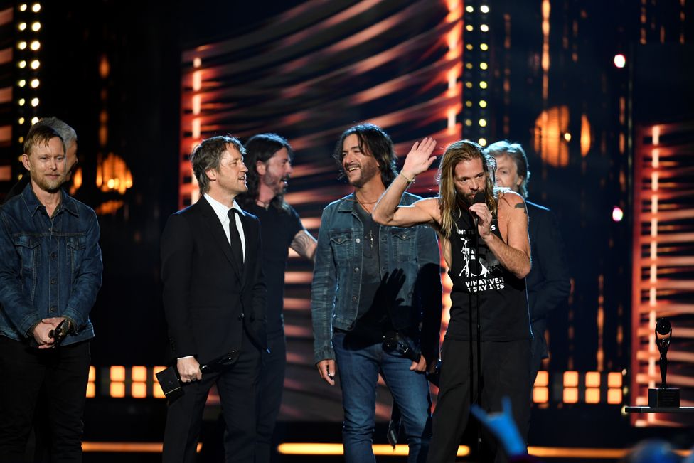 Foo Fighters are inducted into the Rock and Roll Hall of Fame by Paul McCartney, in Cleveland, Ohio, 30 October 2021.