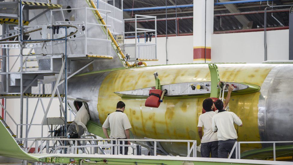 Employees assemble the Legacy 500 at an Embraer plant in Sao Jose dos Campos, Sao Paulo state