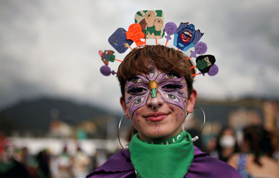 A woman participates in a rally during International Women's Day celebrations in Bogota, Colombia, on 8 March 2022