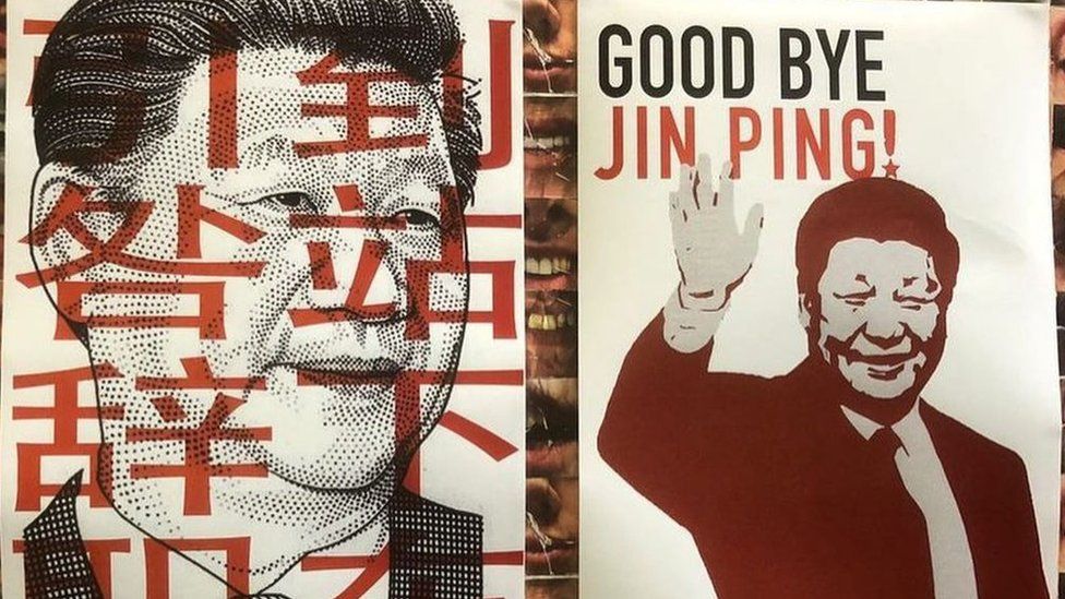 Posters criticising Xi JinPing and saying Goodbye Jin Ping! on a wall at Central Saint Martins university