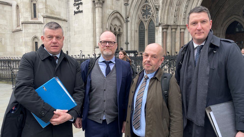 Niall Murphy, Barry McCaffrey, Trevor Birney and John finnucane outside the royal courts of justice