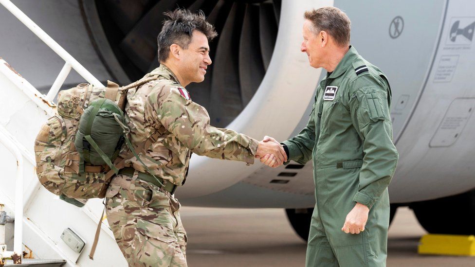 Air Mobility Force Commander to Air Commodore David Manning (R) greets Commander of 16 Air Assault Brigade Brigadier James Martin at RAF Brize Norton