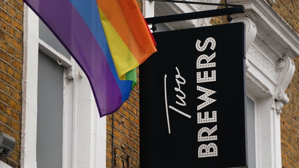 Two Brewers nightclub sign with pride flag