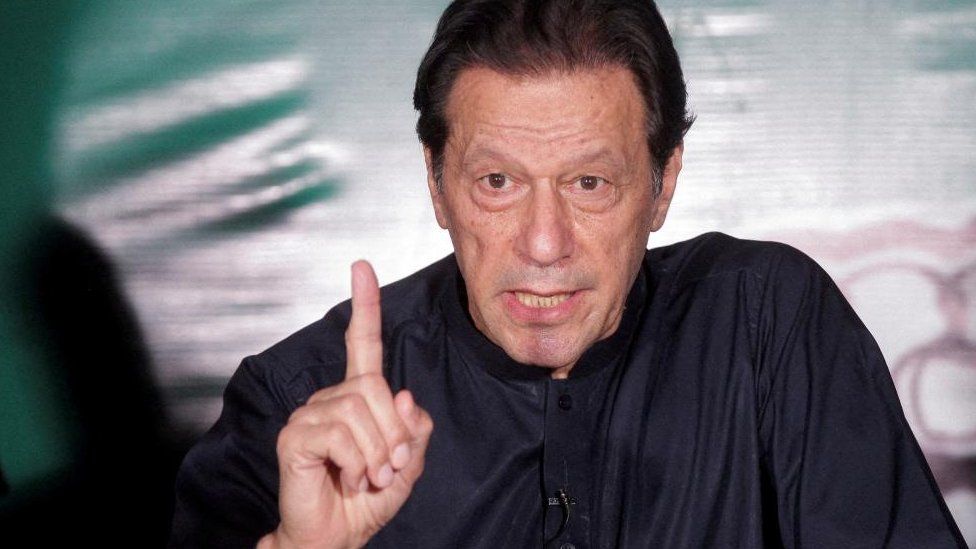 Pakistan's former Prime Minister Imran Khan gestures as he speaks to the members of the media at his residence in Lahore, Pakistan May 18, 2023.