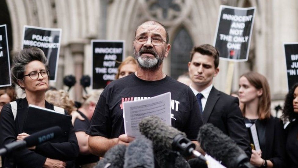 Andrew Malkinson, reads a statement outside the Royal Courts of Justice in London, after being cleared by the Court of Appeal