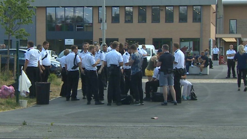 Prison officers outside HMP Berwyn on Monday