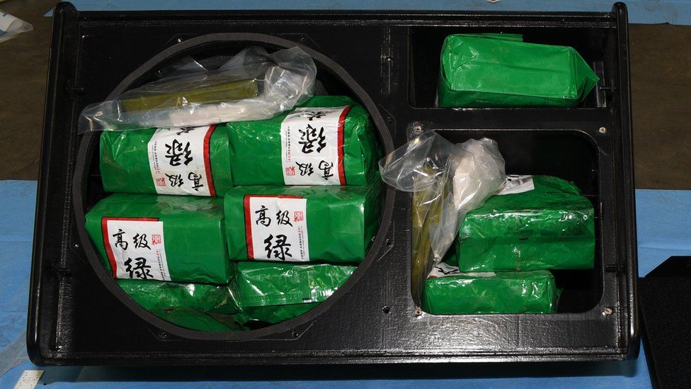 The vacuum-packed packages of the drugs featuring Chinese writing packed inside the stereo speakers