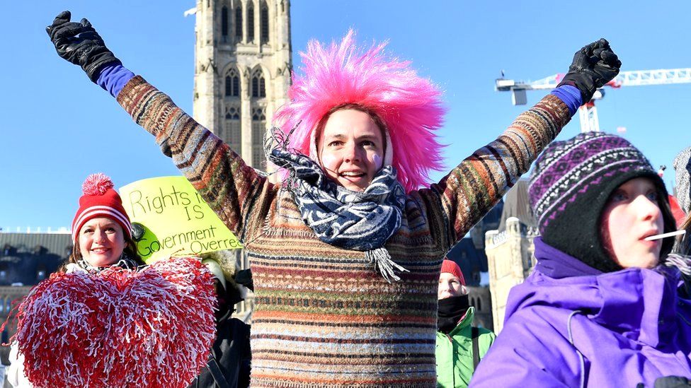 Protesters against vaccine mandates implemented by Canadian Prime Minister Justin Trudeau at Parliament Hill in Ottawa, 5 February 2022