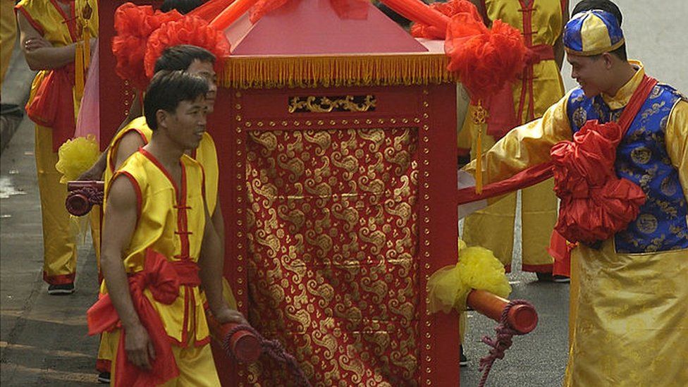 Newlywed couples parade during a traditional mass wedding ceremony on 28 November 2005 in Guangzhou of Guangdong Province, China.