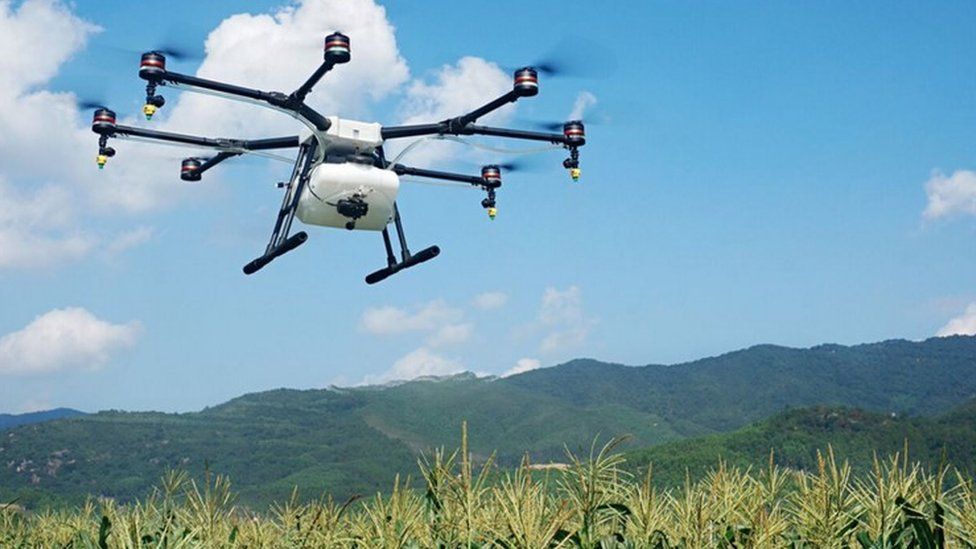 Drone giant DJI launches crop-spraying drone - BBC News