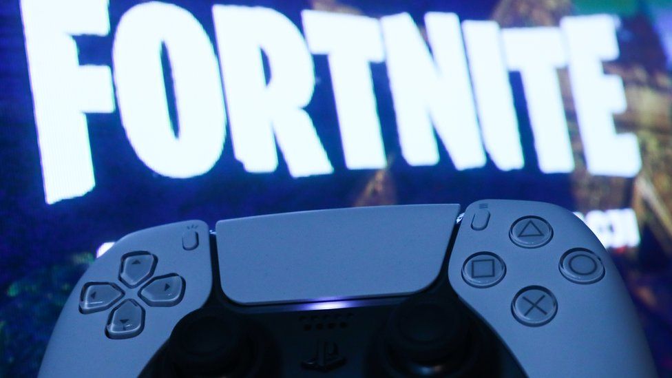 A game controller and Fortnite logo.