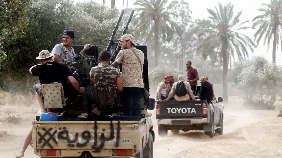 Armed militiamen on trucks in Tripoli, Libya - June 2019
