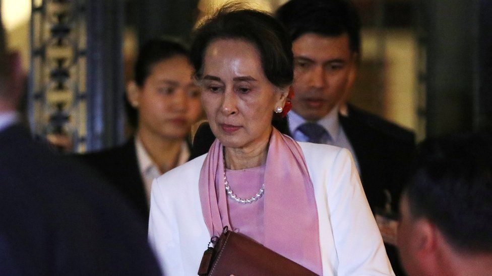 Myanmar's leader Aung San Suu Kyi leaves the International Court of Justice (ICJ), the top United Nations court, after court hearings in The Hague, Netherlands, 12 December, 2019