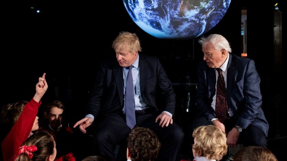 Boris-Johnson-and-David-Attenborough-speak-to-Primary-school-kids-at-event.
