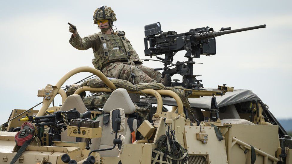 Lt Alice Strawbridge of the Light Dragoons oversees her troops as she takes part in a military exercise on Salisbury Plains on July 23, 2020 near Warminster, England.