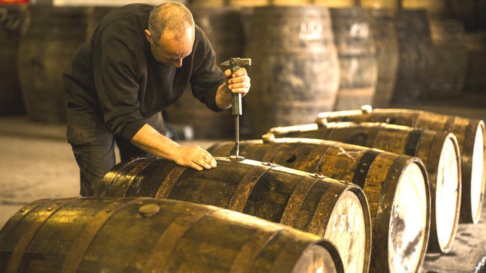 whisky casks in distillery