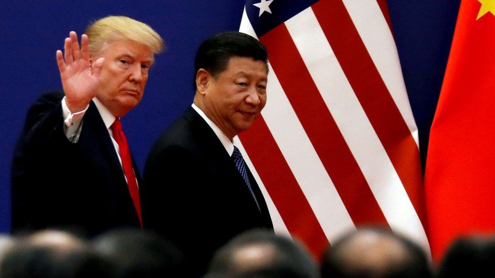 US President Donald Trump and Chinese President Xi Jinping meet business leaders in Beijing in November 2017