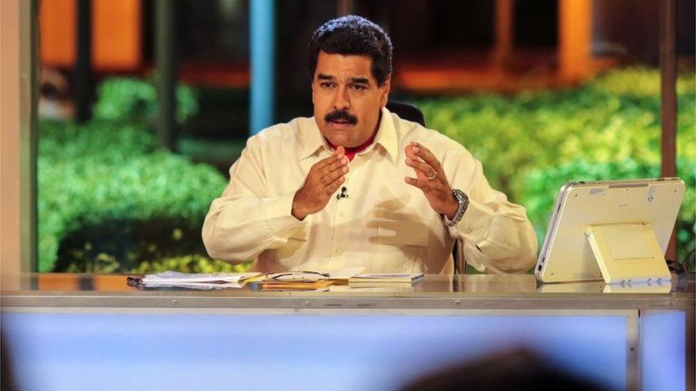 Handout picture released by Venezuelan presidency showing Venezuelan President Nicolas Maduro talking during his TV programme recorded at the Miraflores presidential palace in Caracas on May 10, 2016.