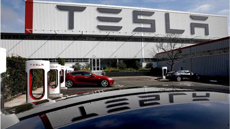 Tesla must pay $137m to racially harassed former worker - BBC News