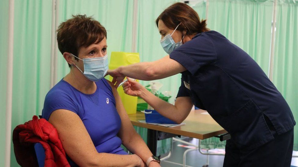A woman being vaccinated in Llanelli, south Wales
